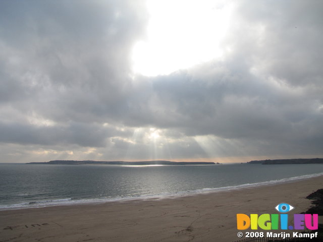 SX01099 Sunrays over island near Tenby